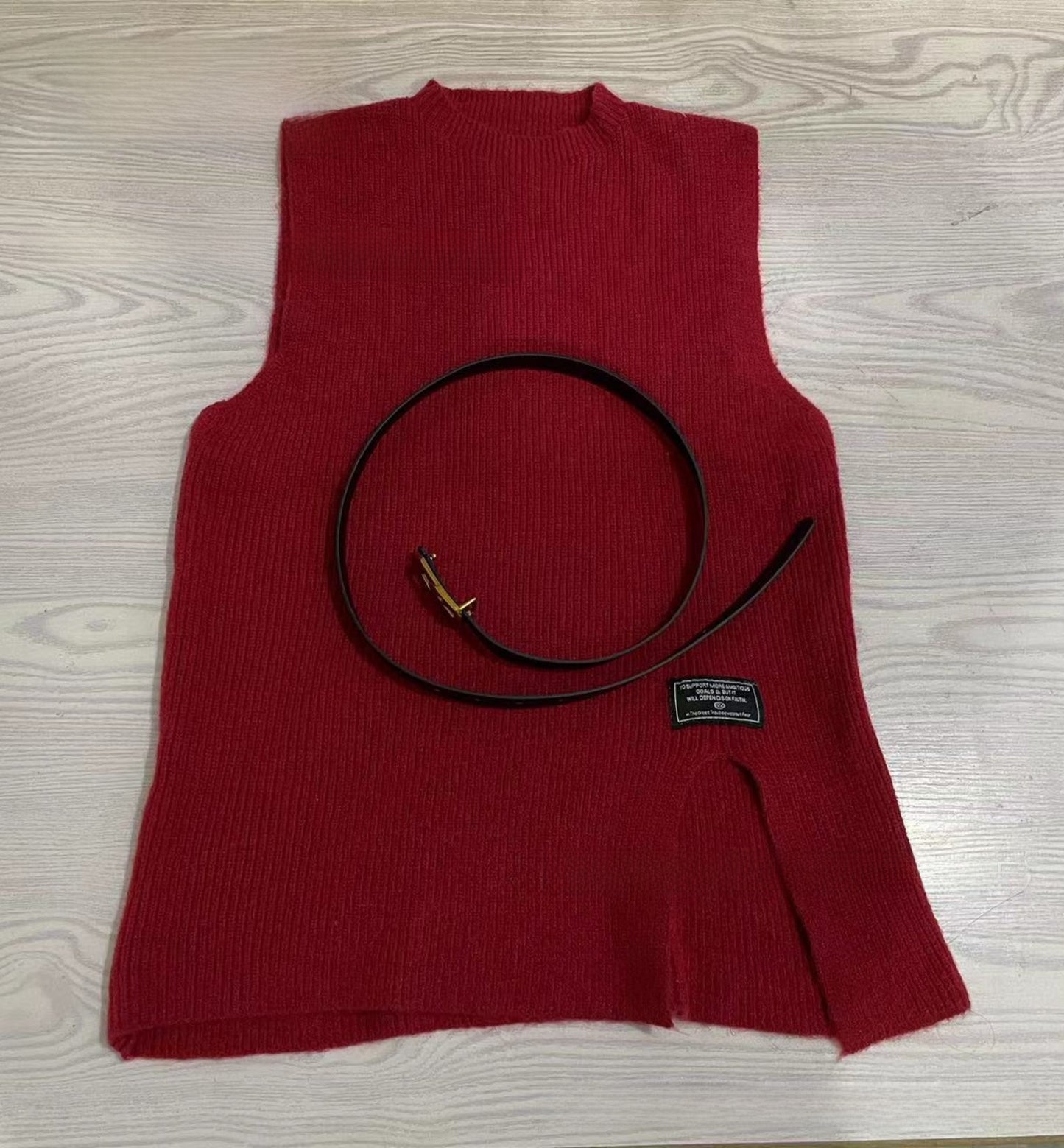 A two-piece loose knitted vest and shirt set for women